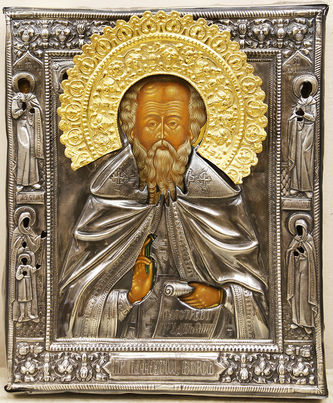 Старинная икона "Святой Пафнутий" в окладе с предстоящими