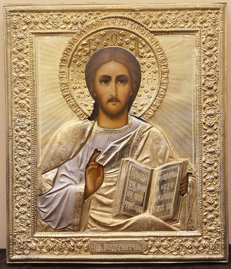 Старинная икона "Господь Вседержитель" в окладе с цветочным орнаментом