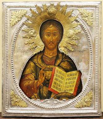 Старинная икона "Господь Вседержитель" в ампирном серебряном окладе с тондо