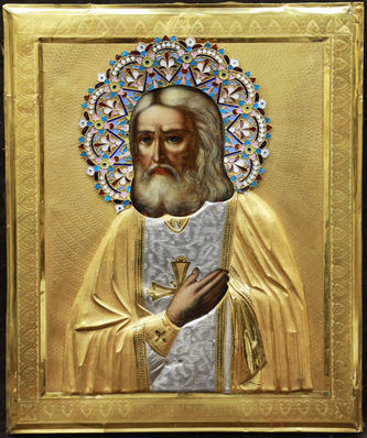 Старинная икона "Серафим Саровский" в окладе с эмалью и гильошированным фоном